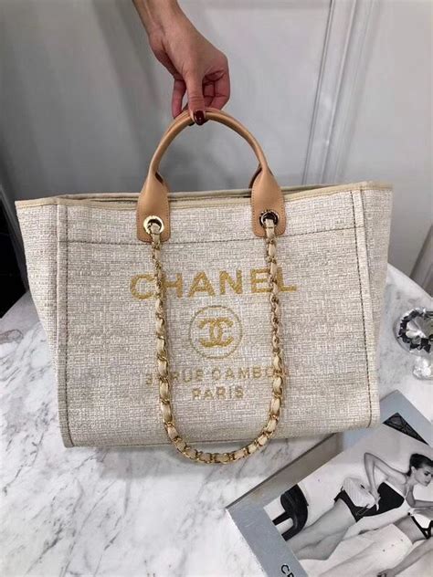 chanel beach bag grey|More.